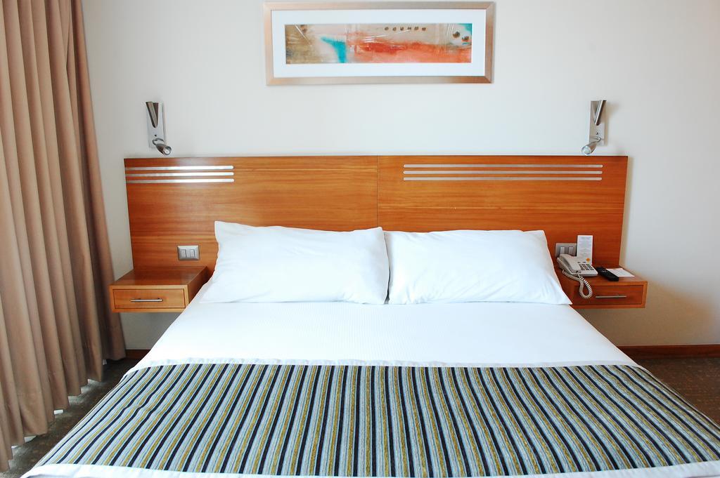 Hotel Alto Del Sol Costanera Antofagasta Chambre photo